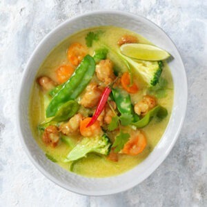 Textured Soya Protein Chunks served in a Thai green curry with carrots, broccoli, mangetout and chillies.