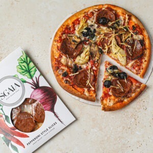 Vegan Pepperoni Style by Sgaia served on vegan pizza with vegan cheese, artichokes and olives.