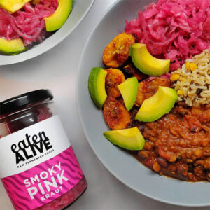 Vegan Smoky Pink Kraut by Eaten Alive served with a bean stew, rice, plantain and avocado.