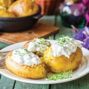 Vegan Sour Cream by Greenvie served on jacket potatoes with cress.