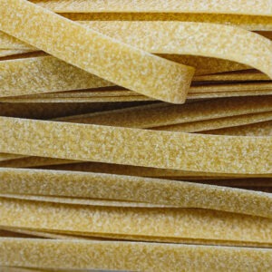 Vegan and gluten-free Rice and Quinoa Tagliatelle pasta by Seggiano shown up close.