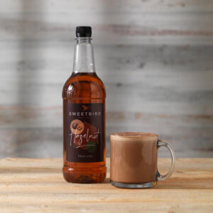 Vegan Hazelnut Classic Syrup by Sweetbird served in a vegan hot chocolate.