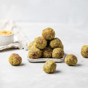 Vegan Falafel Mix by Just Wholefoods served as rolled falafel balls with hummus.