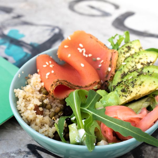 Vegan Gravlax by Revo Foods served with grains, lentils, veggies and pink pickled ginger in a buddha bowl.