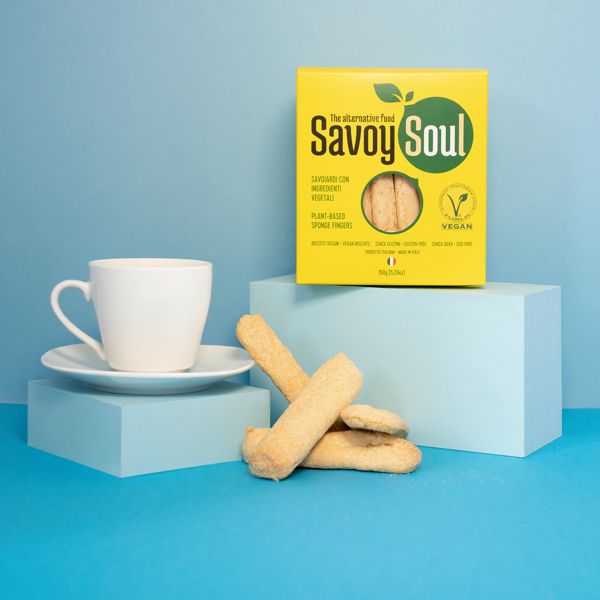 Vegan Gluten Free Savoy Soul Ladyfinger Sponge Biscuits 150g by The Alternative Food shown piled up next to a cup and saucer.